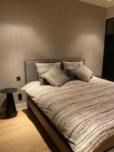 A bed or beds in a room at Guesthouse Andor