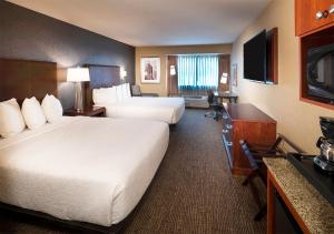 Postel nebo postele na pokoji v ubytování Silver Cloud Hotel - Portland