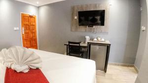 TV a/nebo společenská místnost v ubytování Starlight Inn