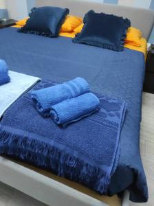 Кровать или кровати в номере Marolù Casa Vacanze