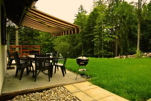 Zahrada ubytování Le Joly Chalet