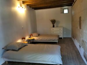 Posteľ alebo postele v izbe v ubytovaní Les prés du petit Morlu - proche Beauval