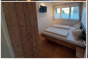 Posteľ alebo postele v izbe v ubytovaní Apartment Bella