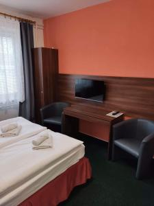 Katil atau katil-katil dalam bilik di Hotel Formanka