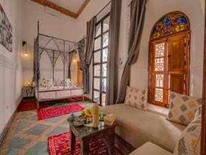 Postel nebo postele na pokoji v ubytování Palais Tinmel Marrakech
