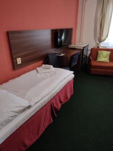 Katil atau katil-katil dalam bilik di Hotel Formanka