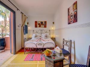 Postel nebo postele na pokoji v ubytování Palais Tinmel Marrakech