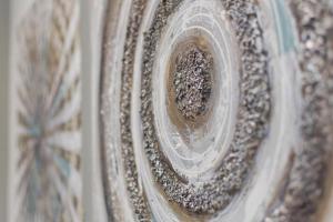 a close up of a vase filled with sand at Fully renovated 1 bedroom condo in Athens