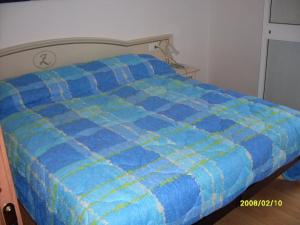 Postel nebo postele na pokoji v ubytování Hotel La Zorza