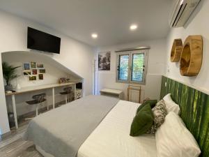 Ένα ή περισσότερα κρεβάτια σε δωμάτιο στο First Beachline Deluxe with Garden and Terrasse in Sun Club +64 φωτογραφίες
