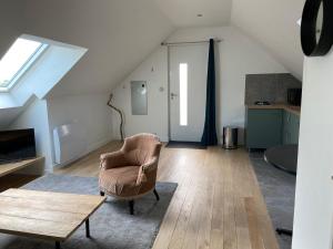 Posezení v ubytování Appartement à l'étage de notre maison