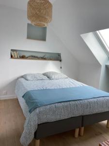 Postel nebo postele na pokoji v ubytování Appartement à l'étage de notre maison