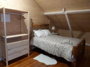 Postel nebo postele na pokoji v ubytování Nerinha Residence