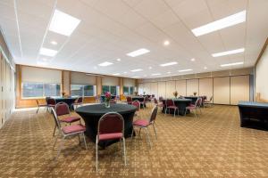 a conference room with tables and chairs in it at Best Western Mountain Lodge At Banner Elk in Banner Elk