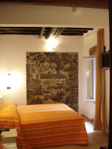 Postel nebo postele na pokoji v ubytování Hotel La Zorza