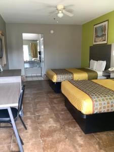 Postel nebo postele na pokoji v ubytování Texas Inn - Welasco/Mercedes