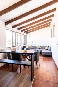 Posezení v ubytování Hostal & Apartments El Triunfo
