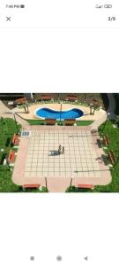 an overhead view of a swimming pool in a park at Apartamento duplex, con terraza y vista de Chiclayo in Chiclayo