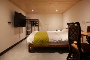 TV a/nebo společenská místnost v ubytování Lemuju B&B Hotel