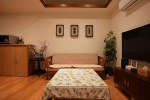 Postel nebo postele na pokoji v ubytování Lemuju B&B Hotel
