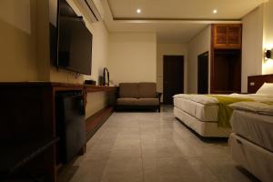 Posezení v ubytování Lemuju B&B Hotel
