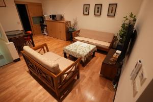 Posezení v ubytování Lemuju B&B Hotel