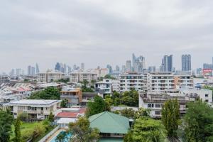 a city with tall buildings in the background at Forum Park Hotel in Bangkok