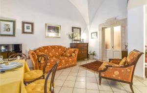 a living room with a couch and a table at Sicily Love Loft in Catania