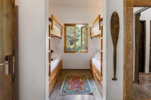 Letto o letti in una camera di The Nomadic Hotel