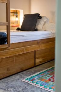 Letto o letti in una camera di The Nomadic Hotel