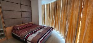 Postel nebo postele na pokoji v ubytování TreeParkCity apartments by WinsHome
