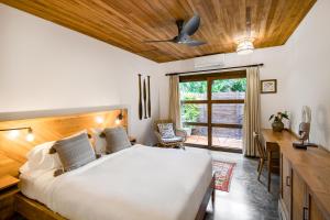 Letto o letti in una camera di The Nomadic Hotel