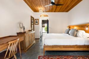 Letto o letti in una camera di The Nomadic Hotel