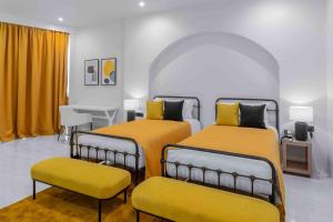 Postel nebo postele na pokoji v ubytování The Gems Mining Pool Villas Pattaya