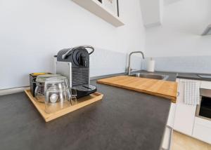 Kuchyň nebo kuchyňský kout v ubytování Ático nuevo en lujosa urbanización junto a restaurantes y cafeterías
