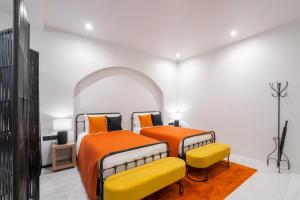 Postel nebo postele na pokoji v ubytování The Gems Mining Pool Villas Pattaya