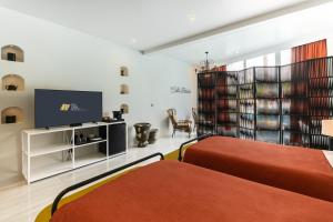 TV a/nebo společenská místnost v ubytování The Gems Mining Pool Villas Pattaya
