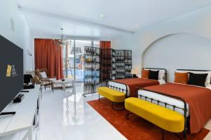 Postel nebo postele na pokoji v ubytování The Gems Mining Pool Villas Pattaya