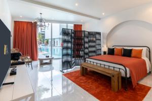 Postel nebo postele na pokoji v ubytování The Gems Mining Pool Villas Pattaya