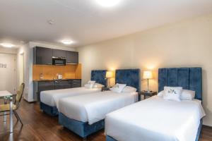 Posteľ alebo postele v izbe v ubytovaní Hotel Residence Loren - contact & contactless check-in
