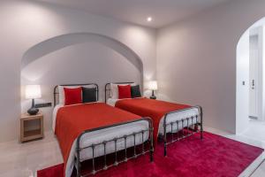 Postel nebo postele na pokoji v ubytování The Gems Mining Pool Villas Pattaya