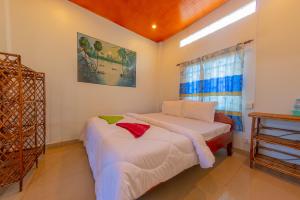 Letto o letti in una camera di The Green Home