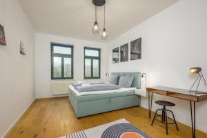 Postel nebo postele na pokoji v ubytování Arbio I Modern Apart near Leipzig Stötteritz