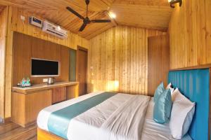 Katil atau katil-katil dalam bilik di Oceano Beach Resort