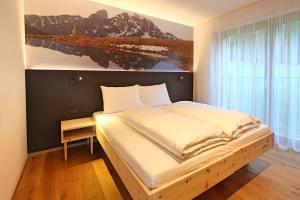 Posteľ alebo postele v izbe v ubytovaní Sunnig Nature Apartments