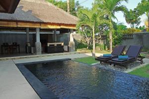 Bazén v ubytování Bumi Linggah Villas Bali nebo v jeho okolí