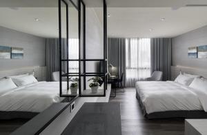A bed or beds in a room at CP Hotel