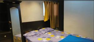 מיטה או מיטות בחדר ב-Hotel Quick Inn By WB Inn
