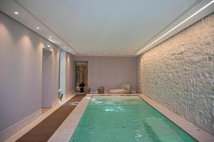 The swimming pool at or close to Ognissanti Restaurant Spa Hotel Rooftop