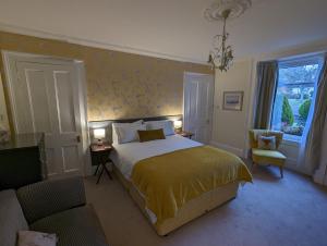 Ένα ή περισσότερα κρεβάτια σε δωμάτιο στο Reiver House Bed & Breakfast
